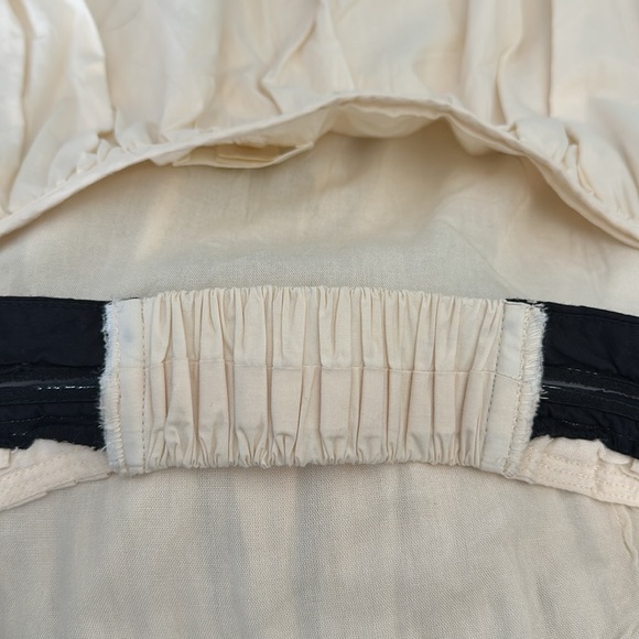 Maeve Strapless Pintuck Open-Back Dress. Color is Ivory with Black bodice trim. - Picture 5 of 5